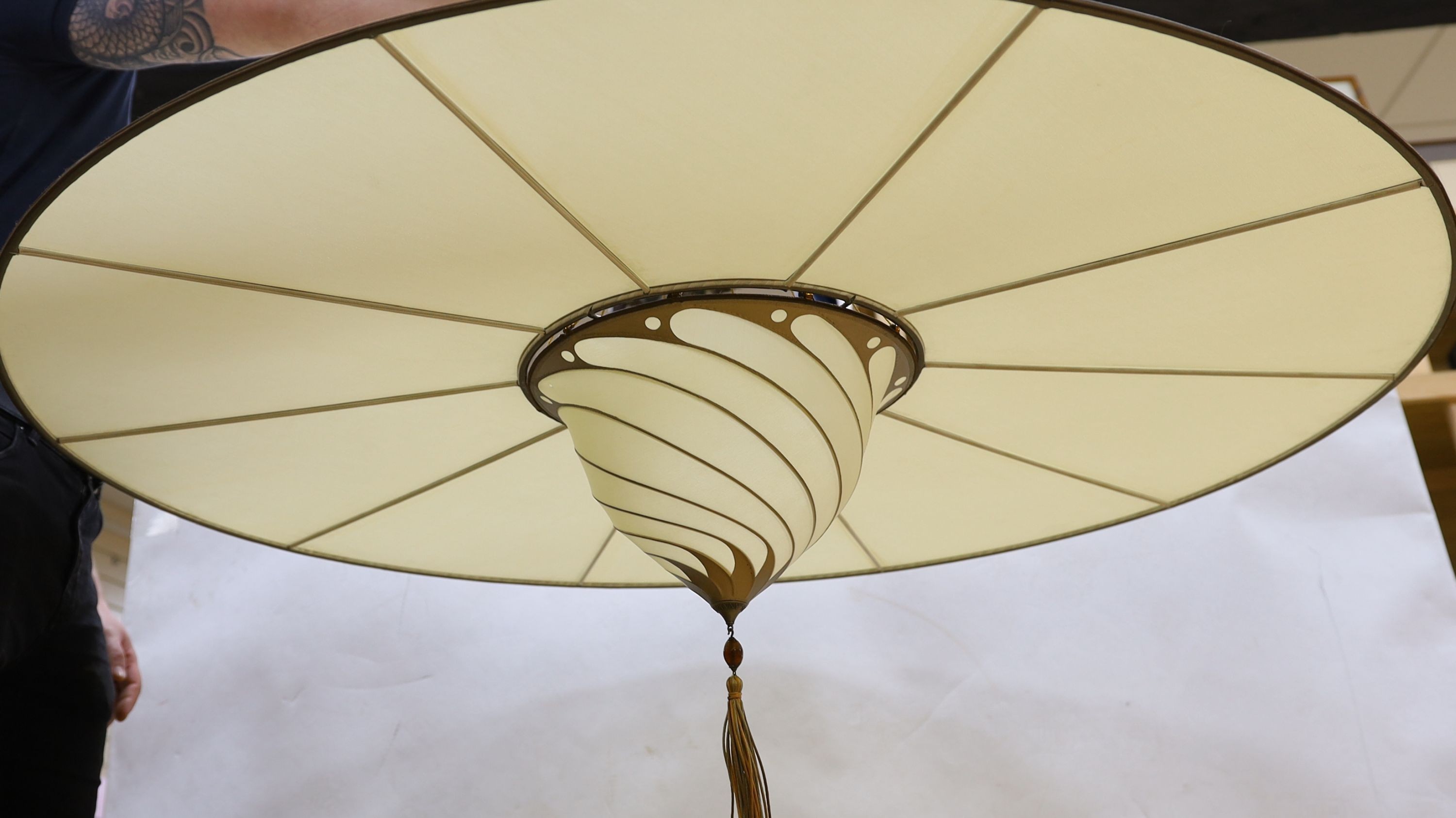 A pair of Fortuny silk ceiling shades with discs